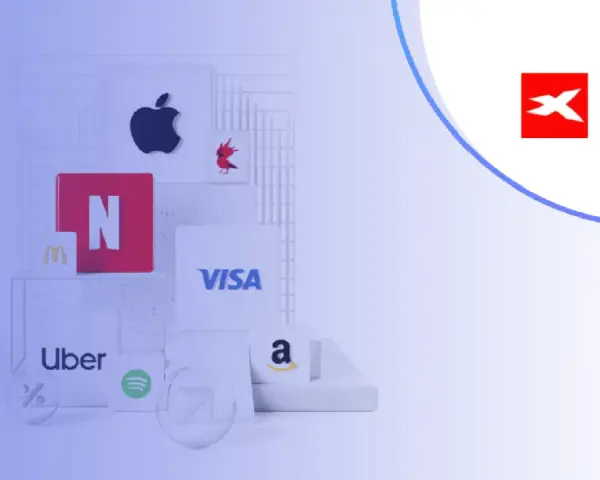 Logo XTB obok ikon znanych marek: Apple, Netflix, McDonald's, Visa, Uber, Spotify, Amazon. Sprawdź XTB opłaty.