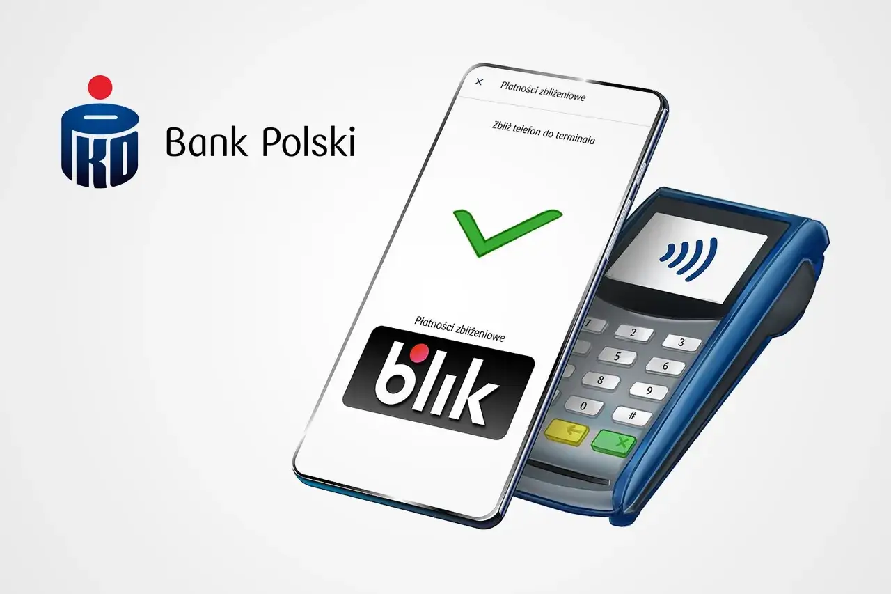 Jak płacić blikiem? Telefon zbliżony do terminala, zielony znaczek potwierdza płatność zbliżeniową. Bank Polski.
